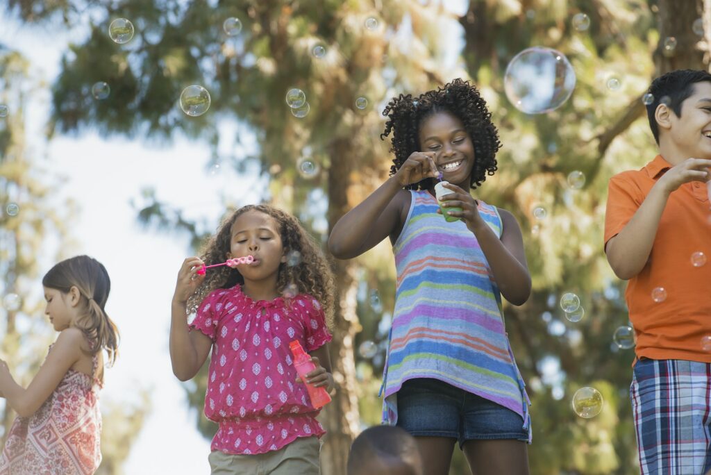 Children playing outdoors in summer