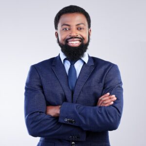 Client 1 - Happy, arms crossed and portrait of black man in studio for professional, corporate and positive.